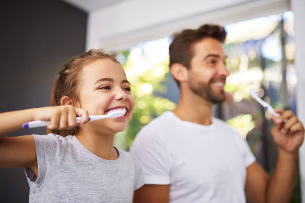 Brushing Teeth Image - Preferred Dental